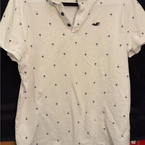 Hollister Cream Polo with Navy Palm Tree Pattern